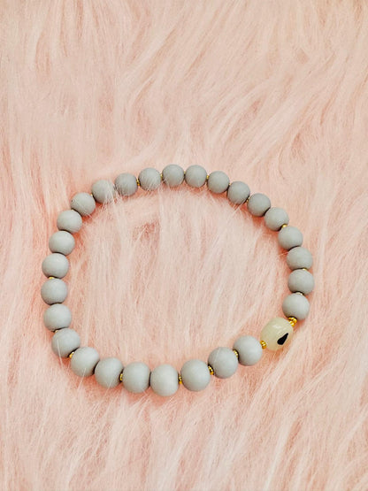 Bracelet Perles Grises et Dorées avec Cœur